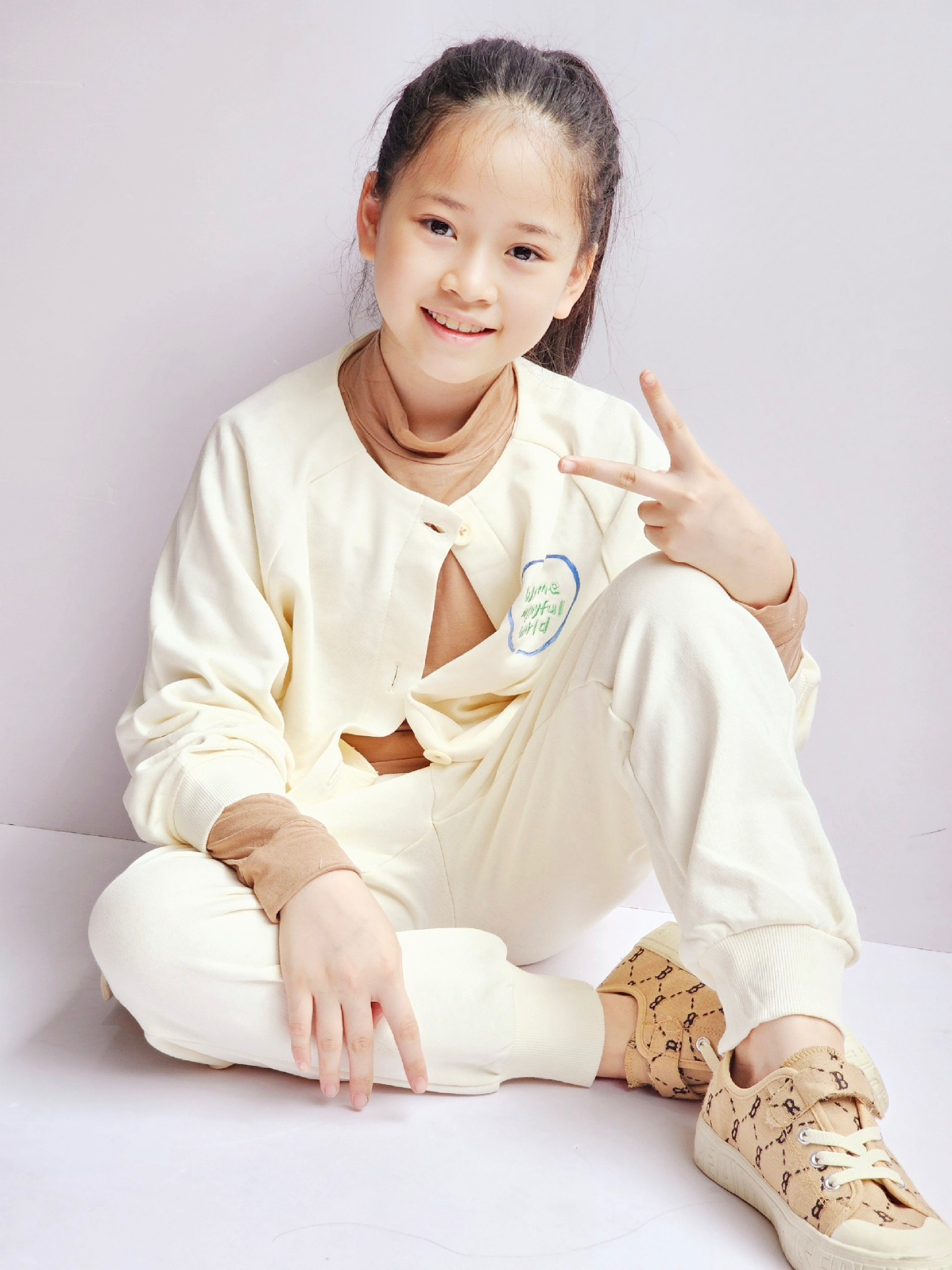 Áo khoác Cardigan nỉ da cá Nepa trắng kem ngực in hình táo size 110 - 155