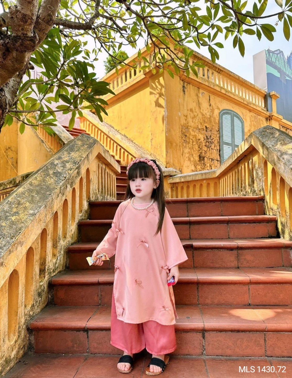 Áo dài Melisa màu hồng đính nơ - kèm bờm size 2 - 12y