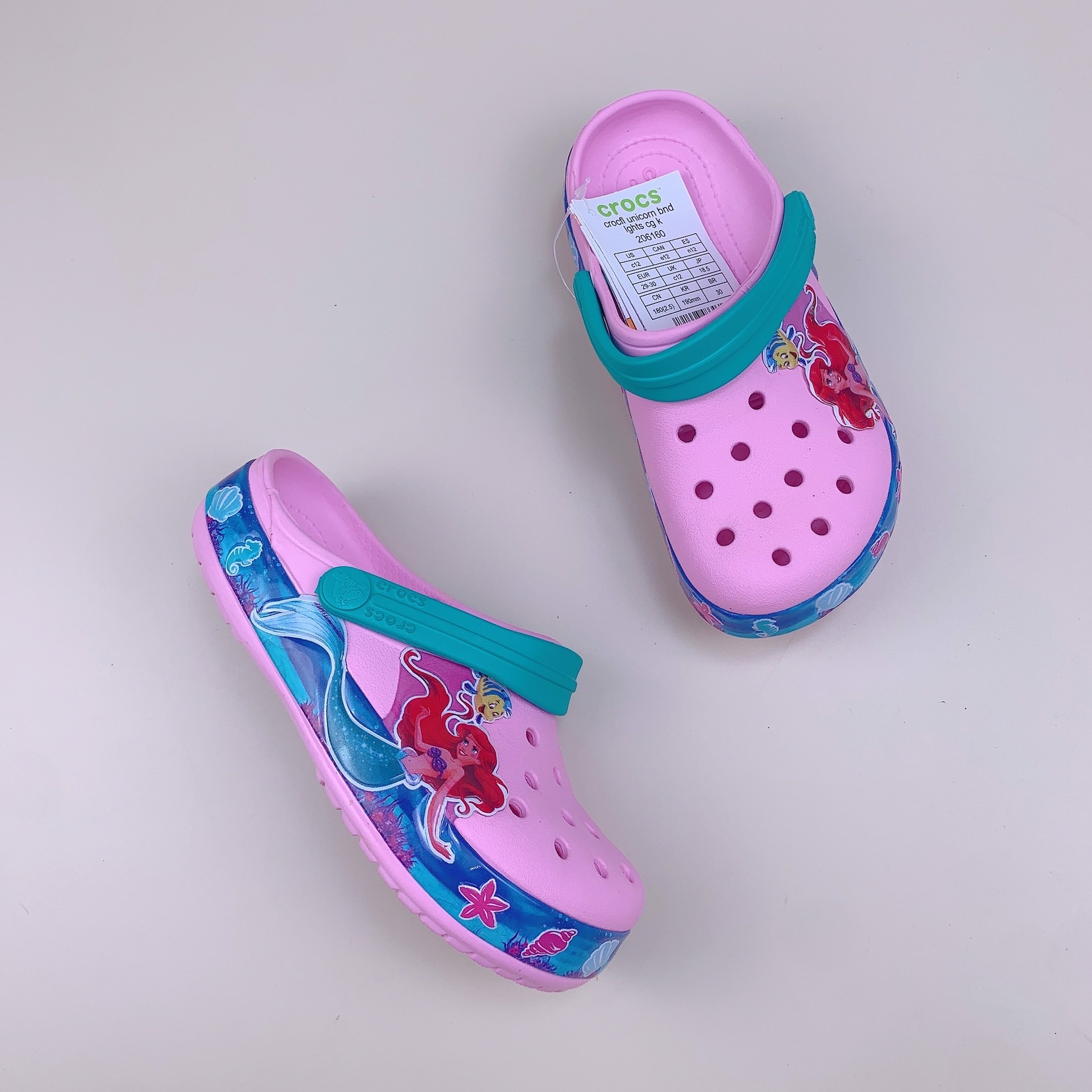Sục Crocs tiên cá hồng viền xanh BG