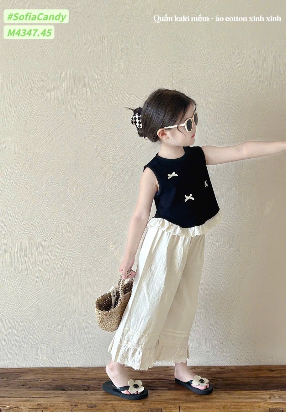 M4347 - Bộ Mia Kids tiểu thư áo đen đính nơ + quần culottes màu kem size 1-10y
