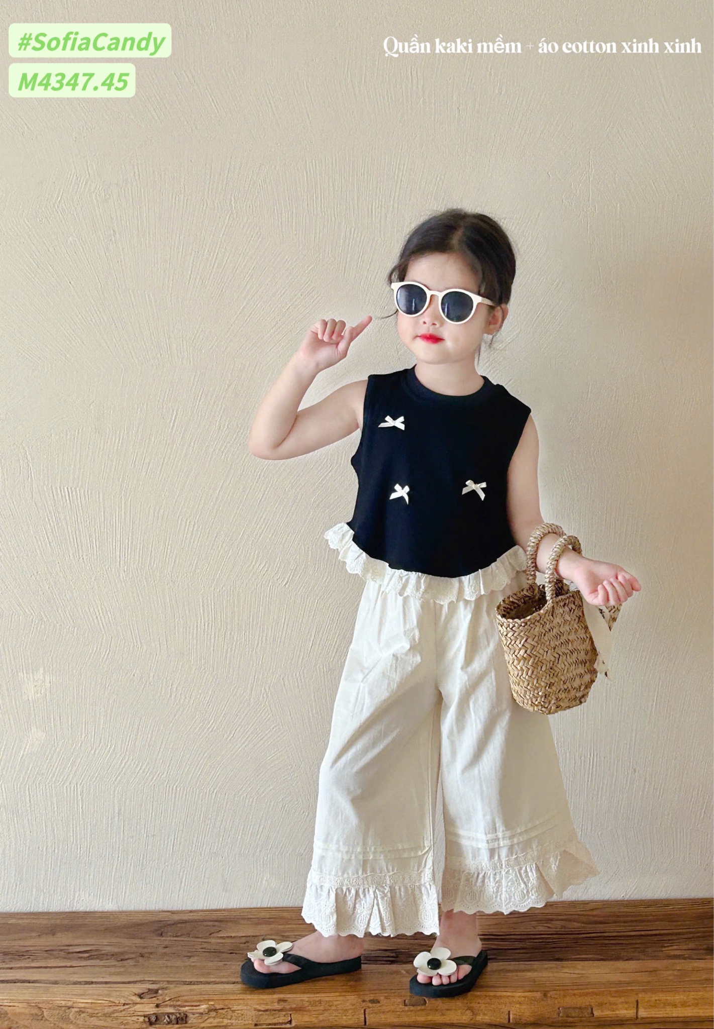 M4347 - Bộ Mia Kids tiểu thư áo đen đính nơ + quần culottes màu kem size 1-10y