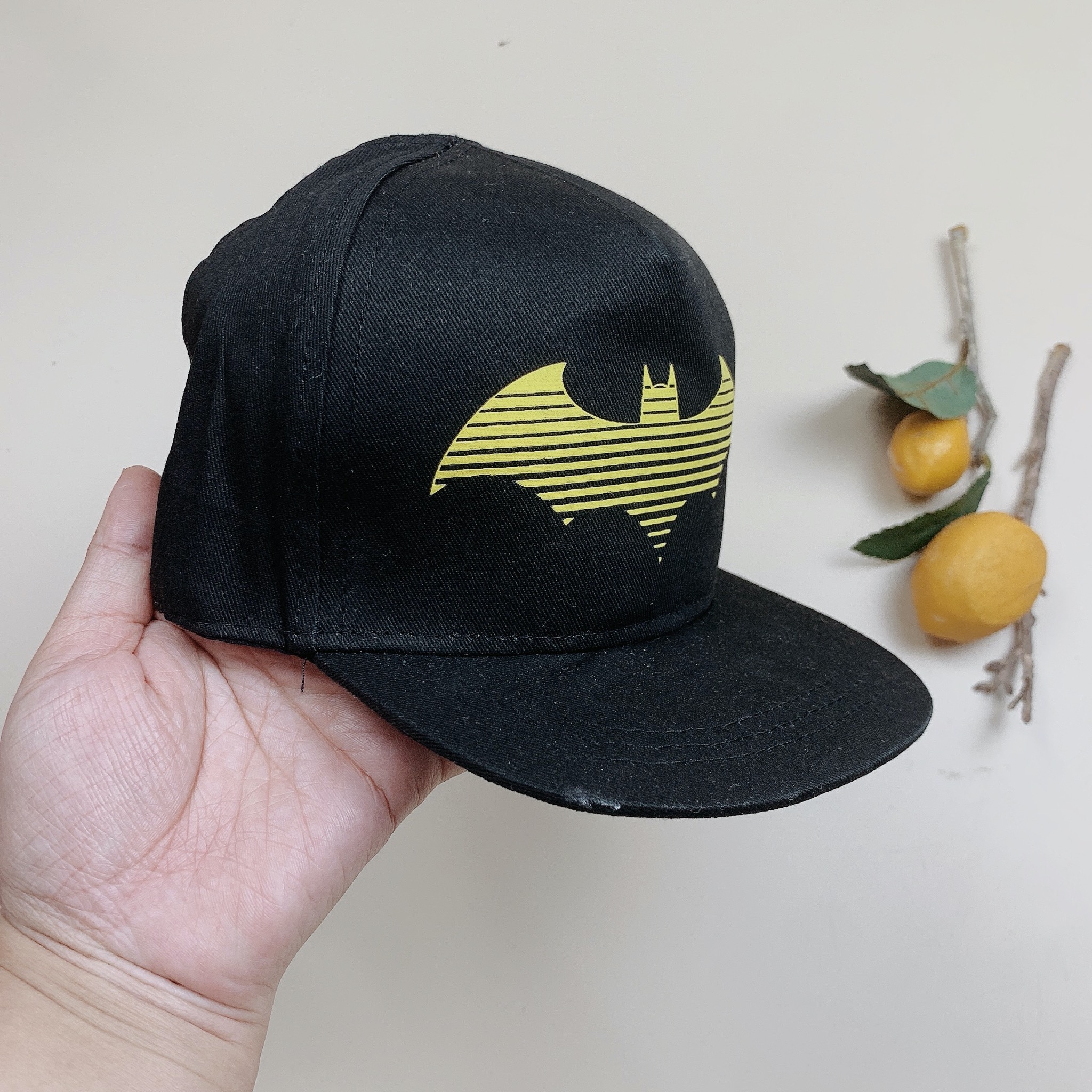 Mũ HM màu đen hoạ tiết batman vàng BT
