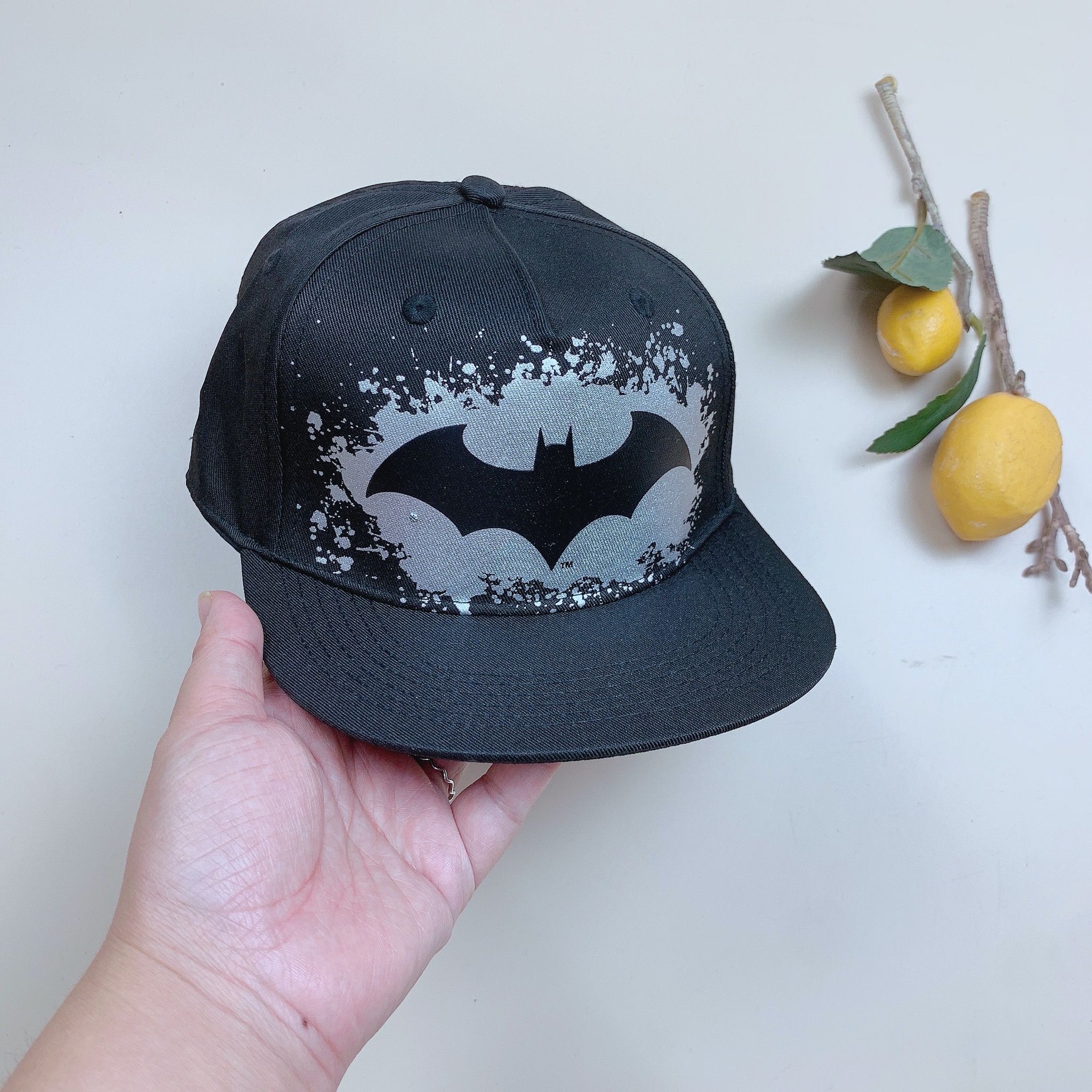 Mũ HM màu đen phối bạc hoạ tiết batman size 4-8y