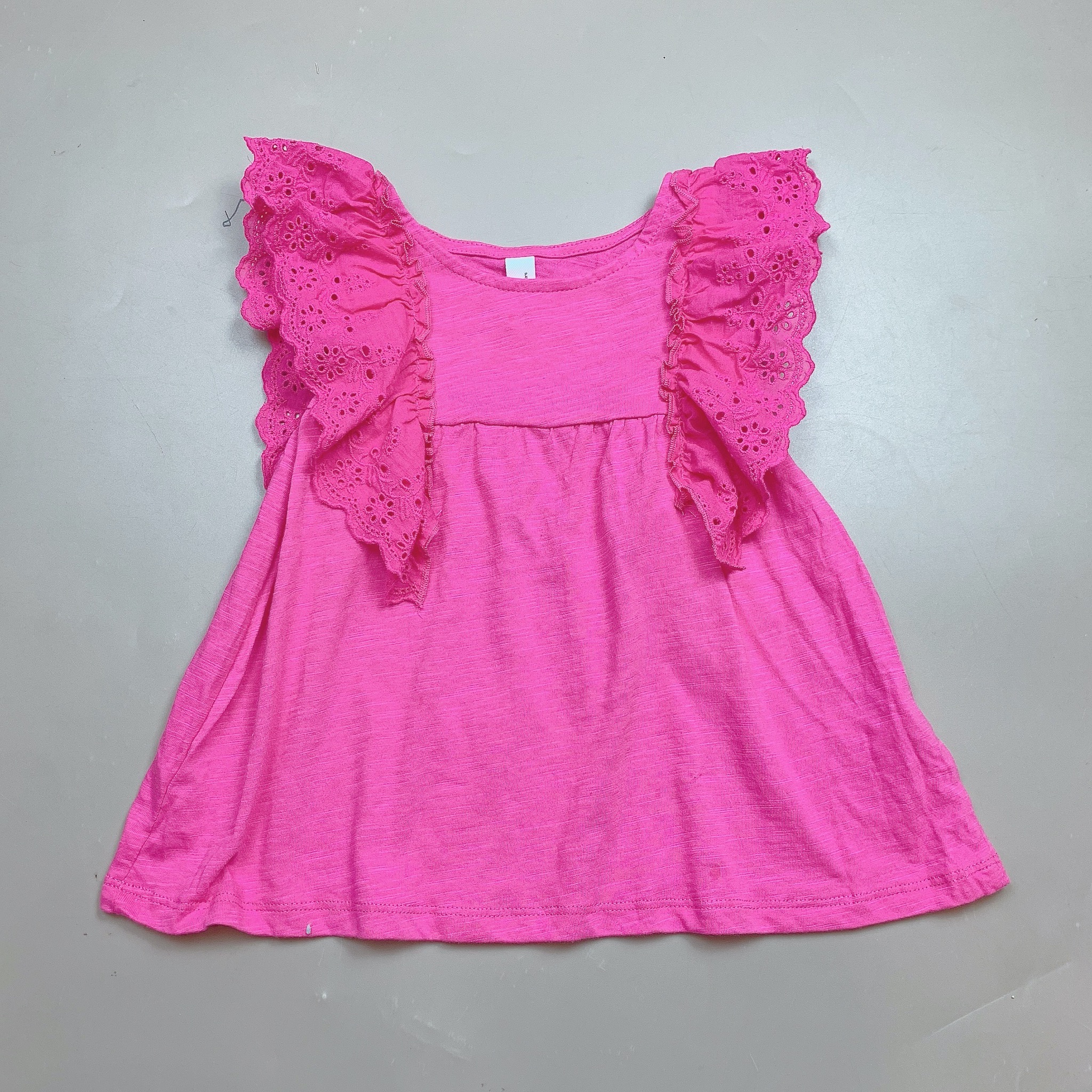 Áo cotton xước Sela tay cánh tiên thô đục lỗ 2 màu hồng/tím BG