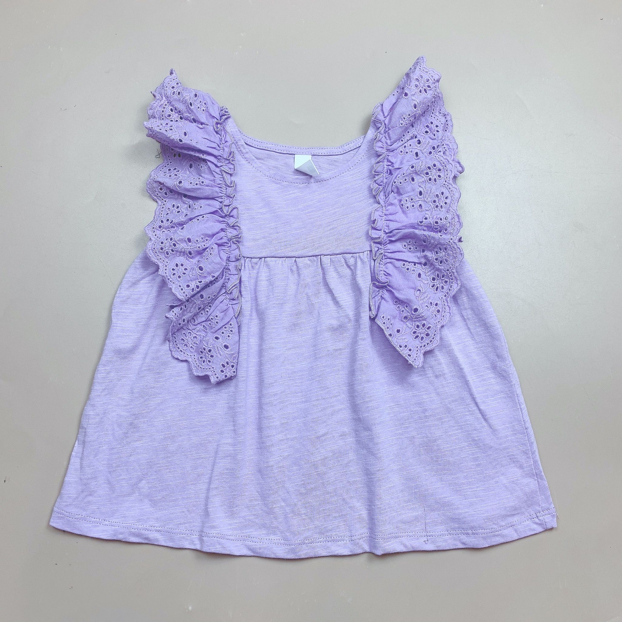 Áo cotton xước Sela tay cánh tiên thô đục lỗ 2 màu hồng/tím BG