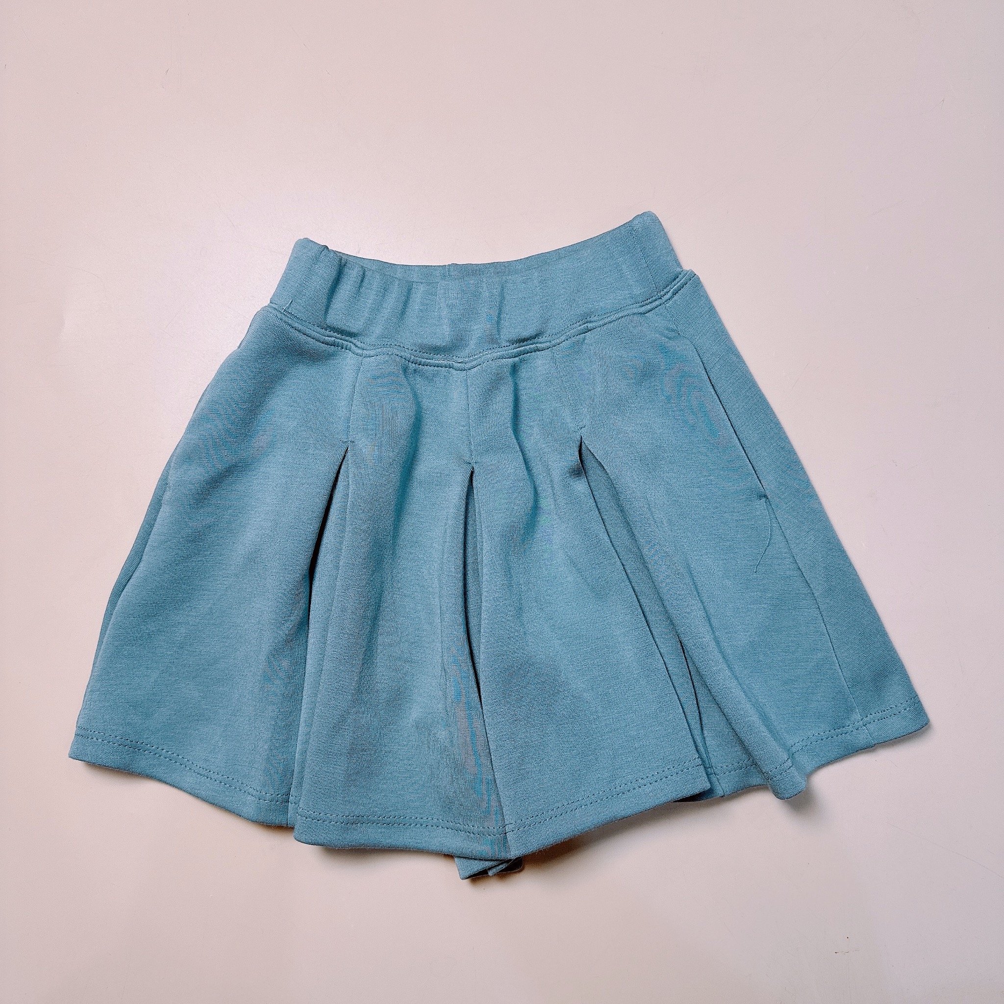 Quần váy xếp ly vải thun mềm nhiều màu cho bé gái size 110-160