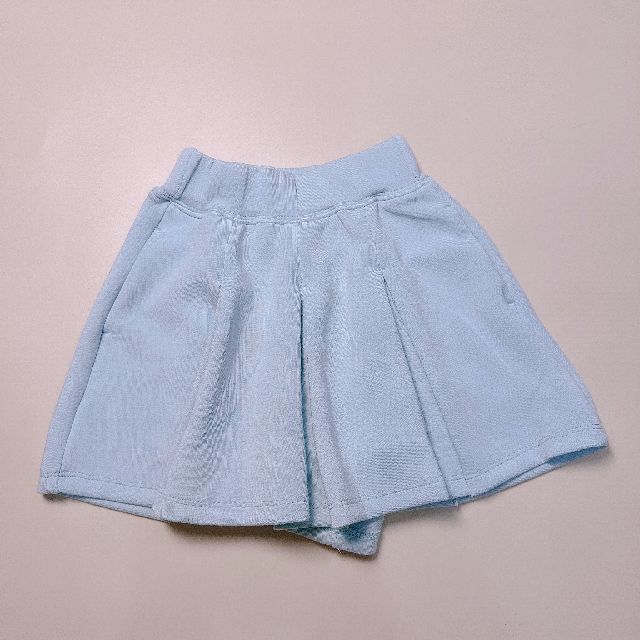 Quần váy xếp ly vải thun mềm nhiều màu cho bé gái size 110-160