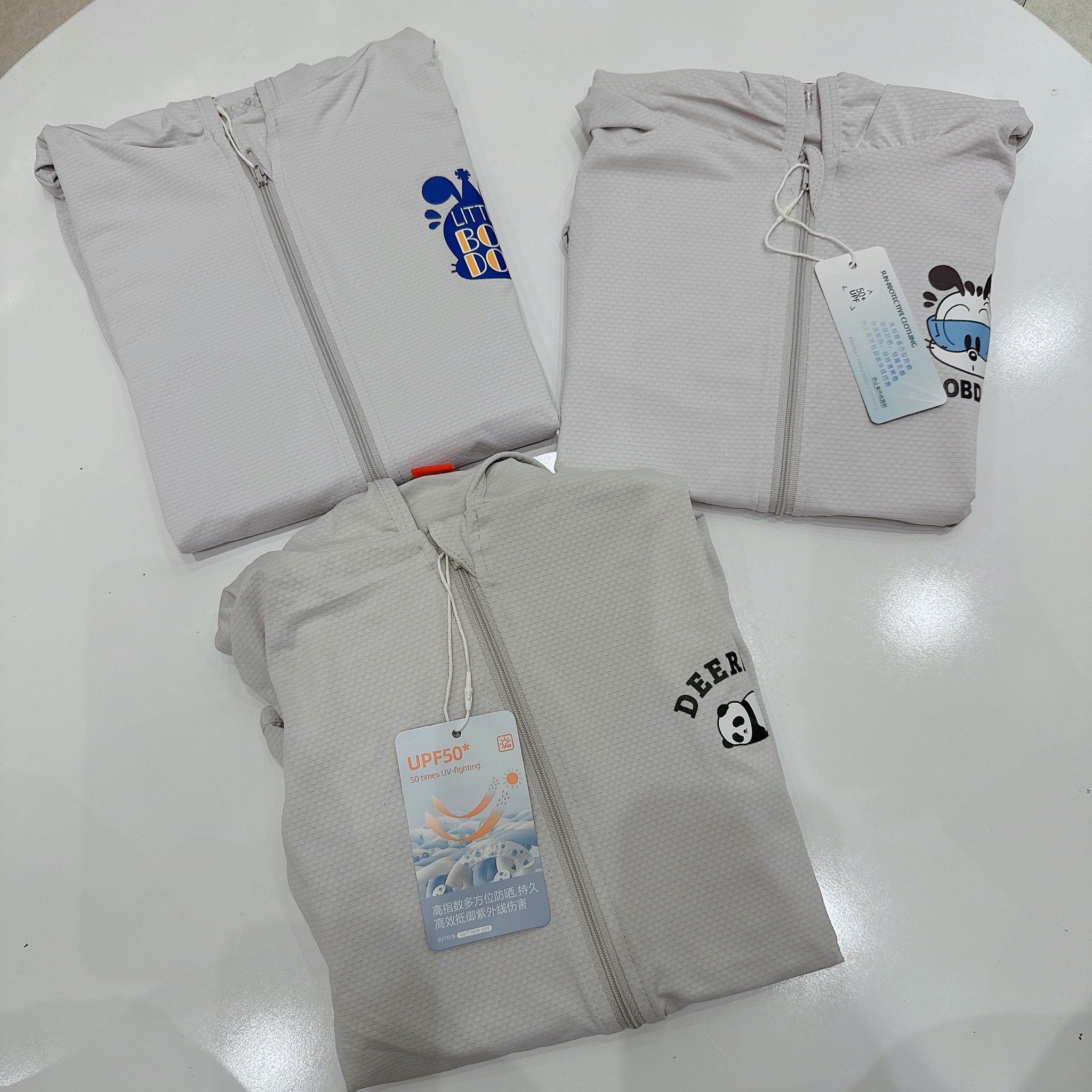 Áo khoác chống nắng vải dệt +50UPF nhiều màu họa tiết ngẫu nhiên size 110-160