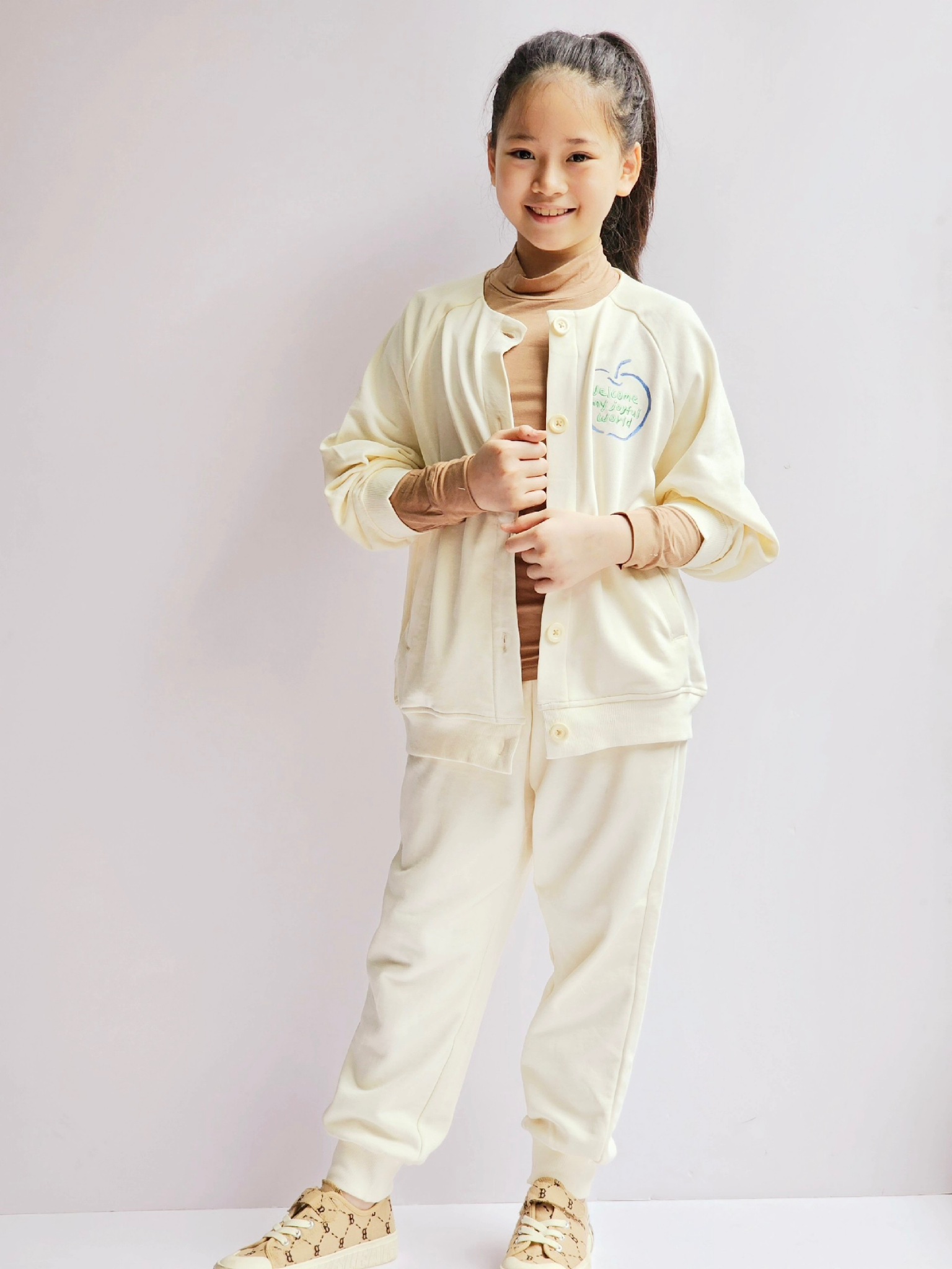 Áo khoác Cardigan nỉ da cá Nepa trắng kem ngực in hình táo size 110 - 155