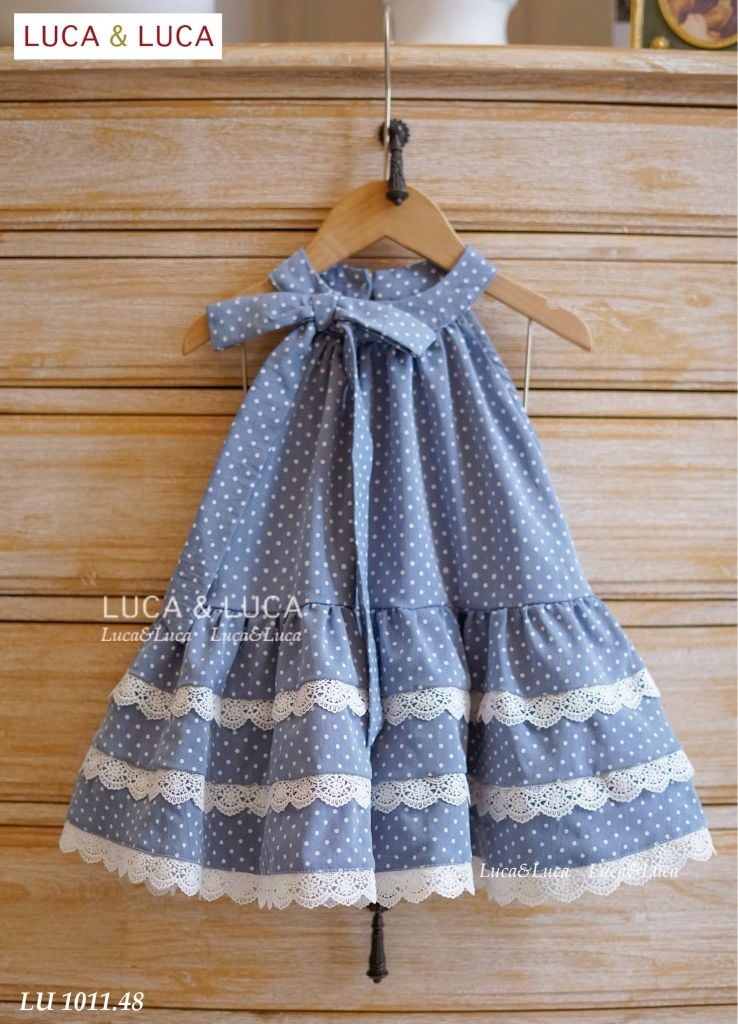 Lu 1011 - Váy Luca denim xanh chấm bi cổ yếm phối nơ bé gái size 2-12y