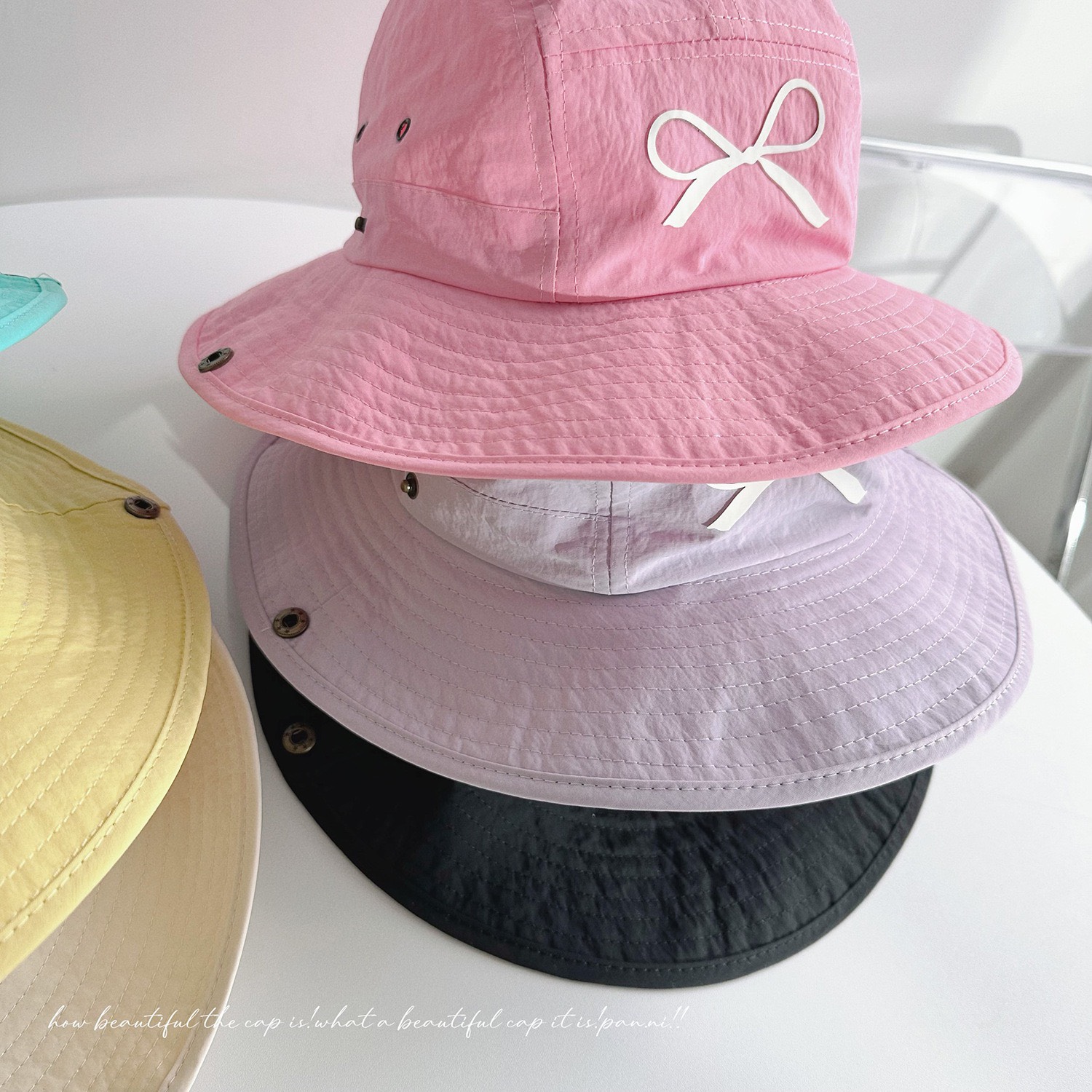 Mũ vải dù tai bèo in nơ 6 màu ( Free size 52 - 54cm )