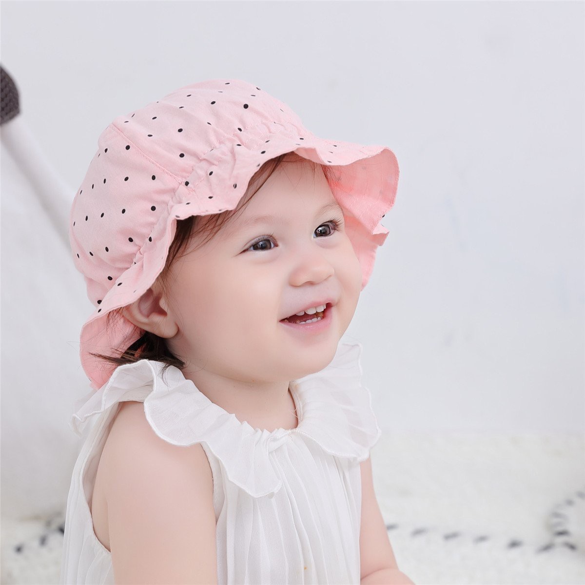 Mũ vải vành Miller bo chun chấm bi xanh/hồng freesize 2-4y