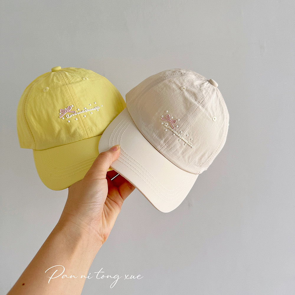 Mũ lưỡi trai vải si gió đính nơ nhiều màu cho bé size 4-14y