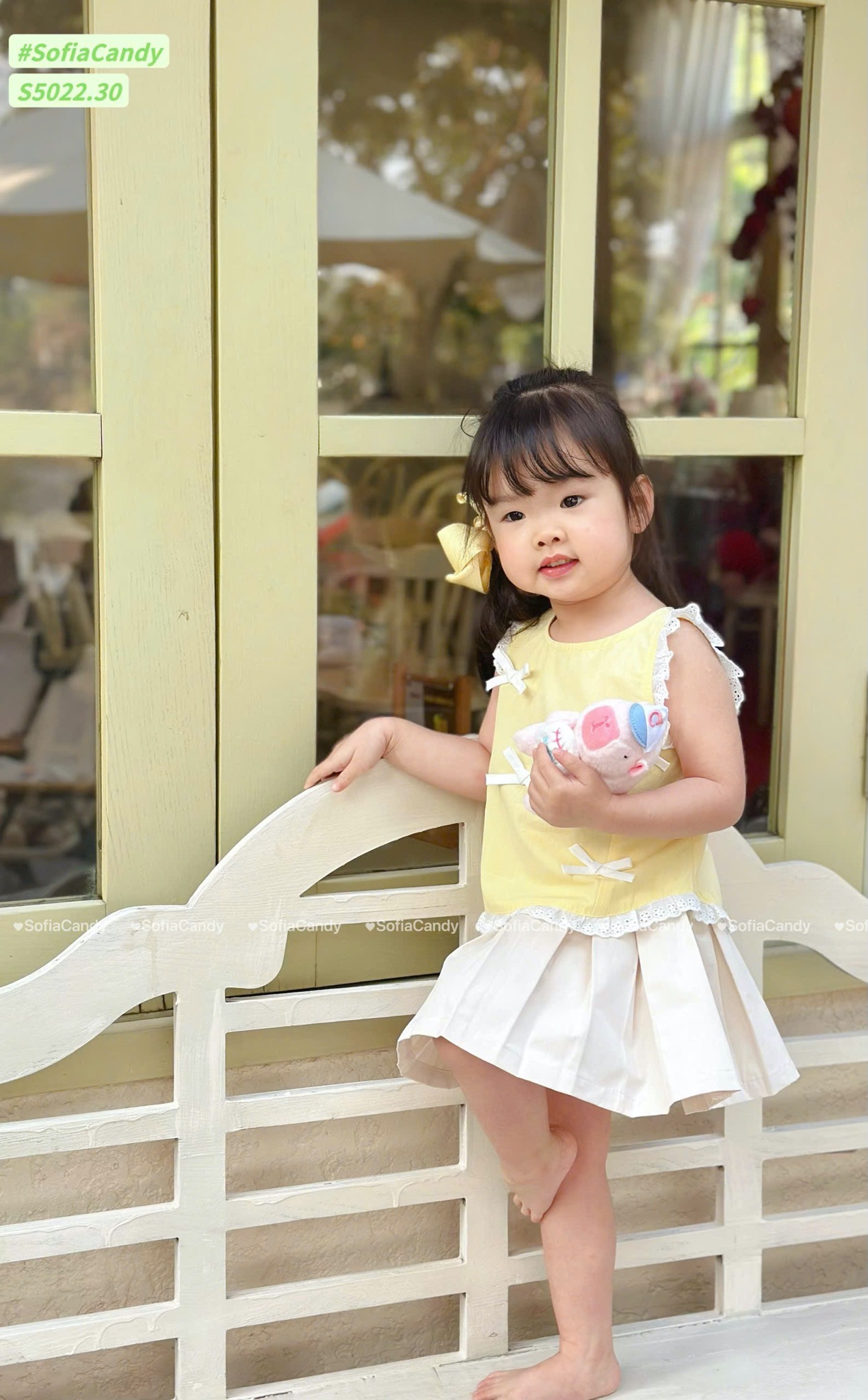 S5022 - Set bộ Sofia Candy áo đính  nơ + chân váy liền quần vàng/kẻ hồng bé gái size 1-10y