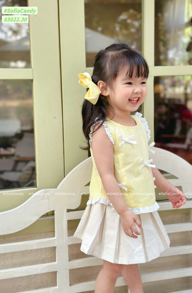 S5022 - Set bộ Sofia Candy áo đính  nơ + chân váy liền quần vàng/kẻ hồng bé gái size 1-10y