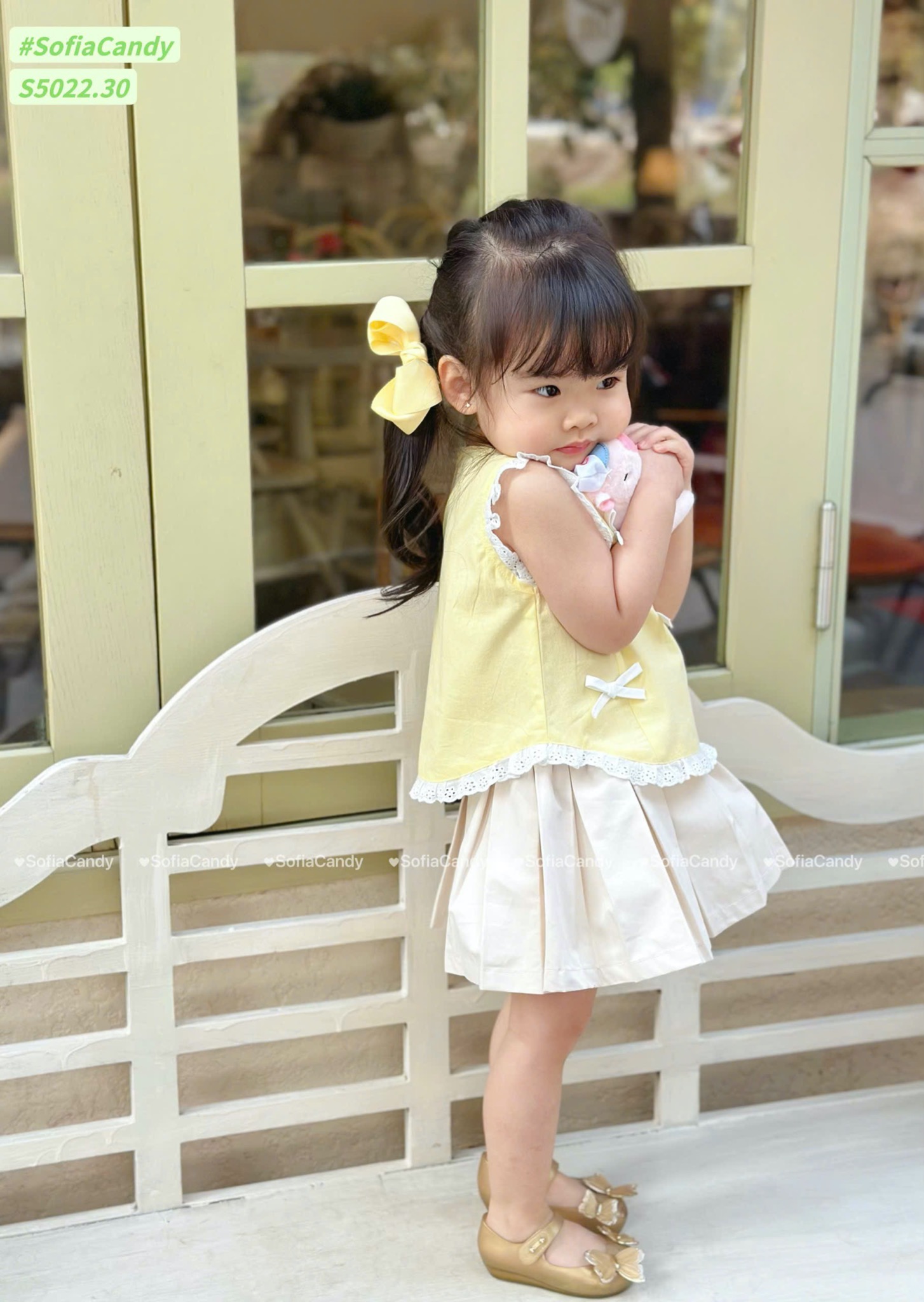 S5022 - Set bộ Sofia Candy áo đính  nơ + chân váy liền quần vàng/kẻ hồng bé gái size 1-10y