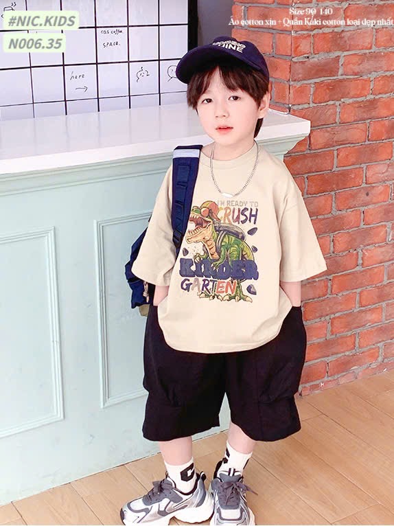 N006 - Bộ cotton Nickids màu be in khủng long phối quần kaki đen bé trai size 90-140