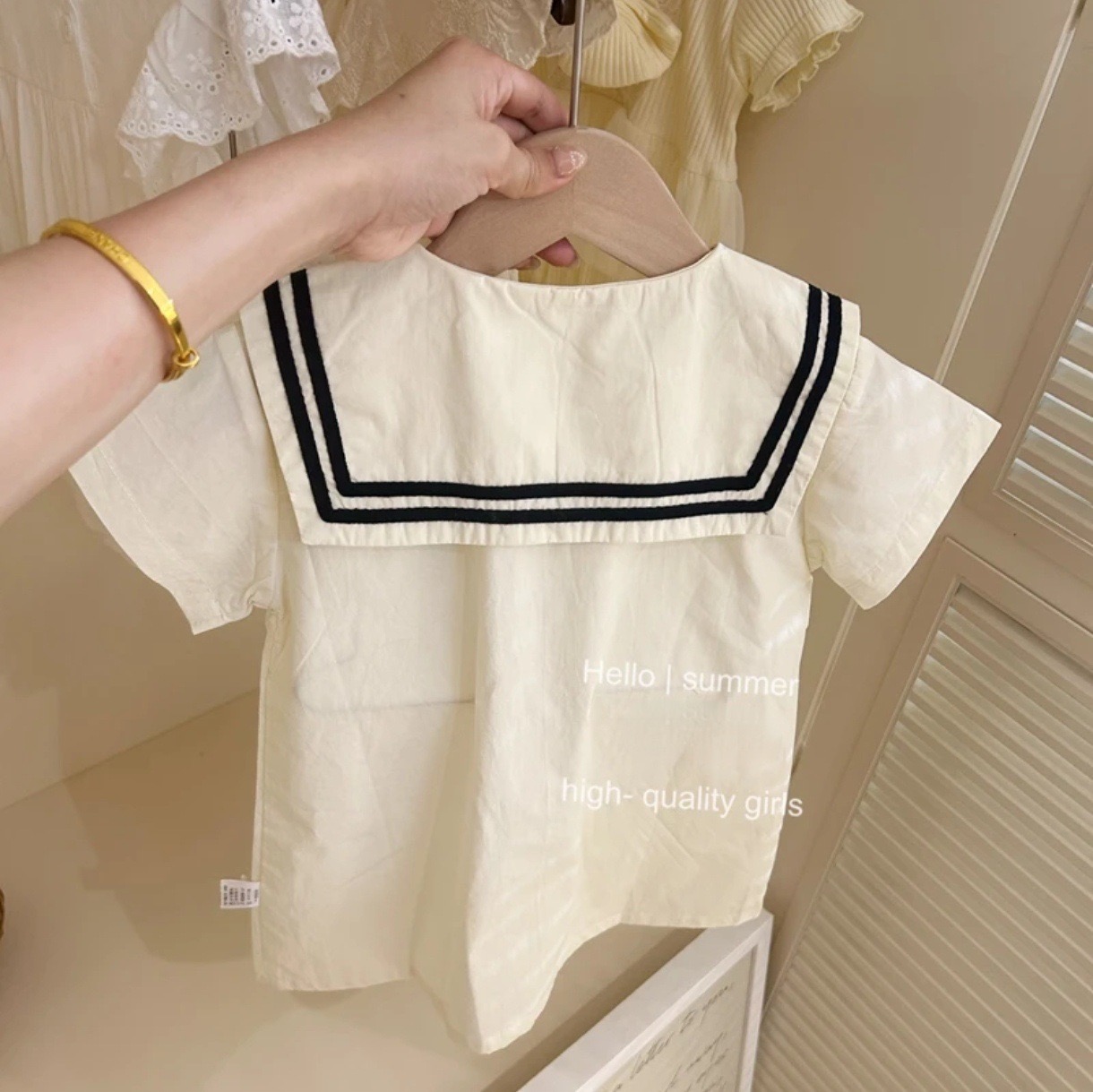 Váy QC màu trắng cổ thuỷ thủ bé gái size 80-130