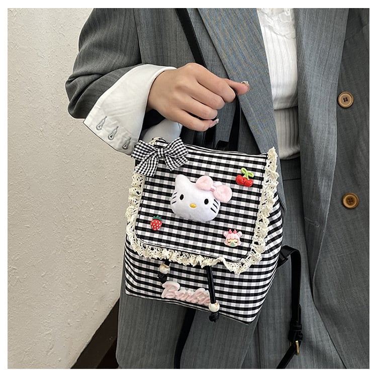 Ba lô Hello Kitty màu caro đen bé gái