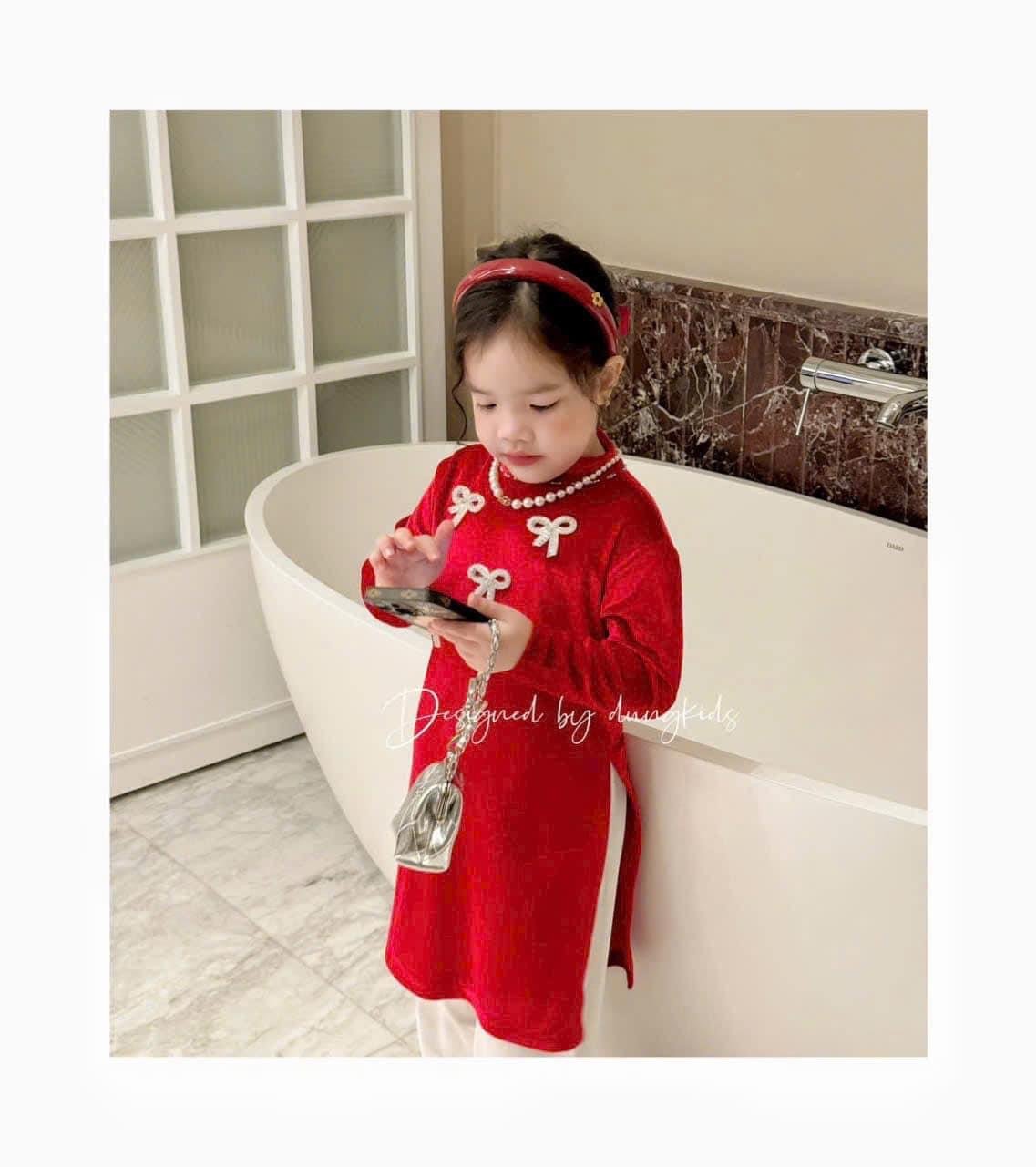 Áo dài Dungkids vải nhung tuyết đính tràn nơ nhỏ 2 màu đỏ, xanh bé gái size 1-10y