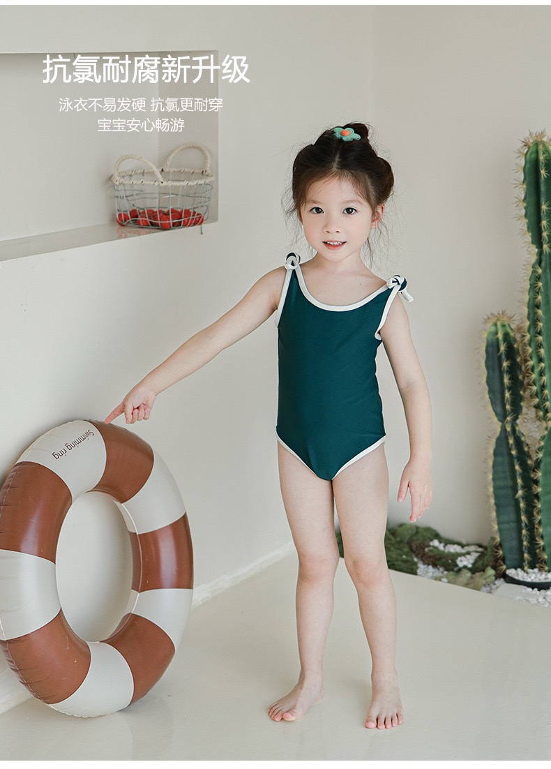 Bộ bơi liền thân kèm mũ trơn màu viền trắng nhiều màu bé gái size 80-130