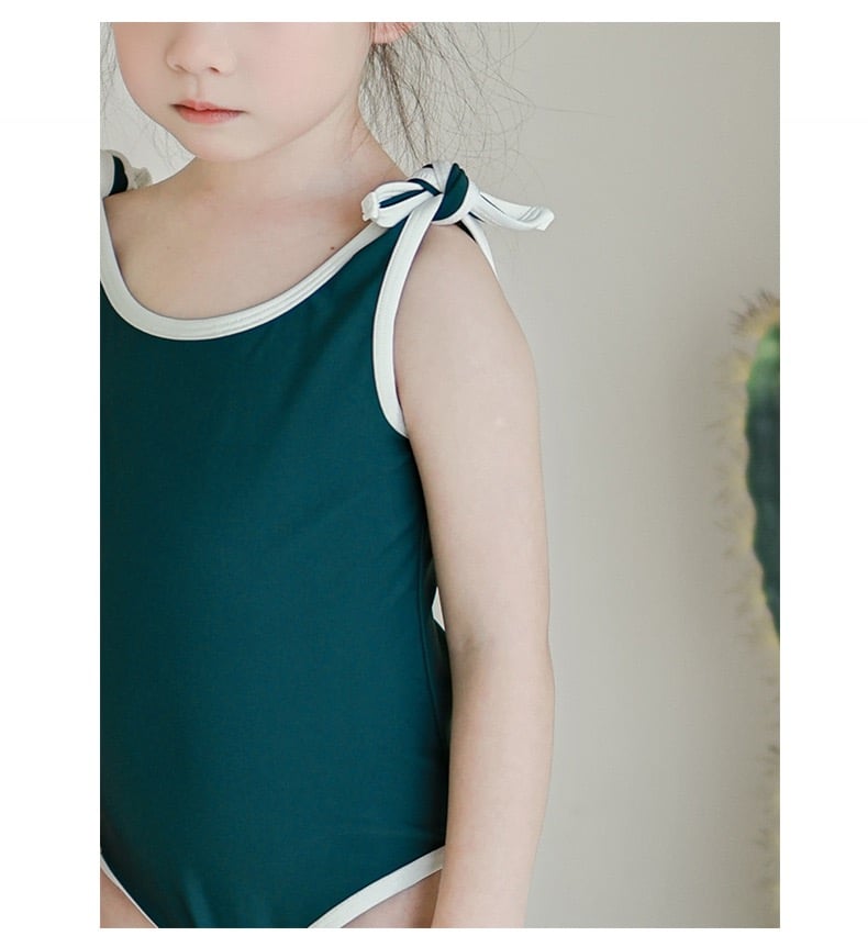 Bộ bơi liền thân kèm mũ trơn màu viền trắng nhiều màu bé gái size 80-130