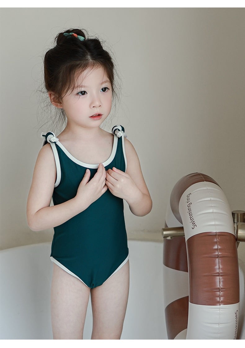 Bộ bơi liền thân kèm mũ trơn màu viền trắng nhiều màu bé gái size 80-130