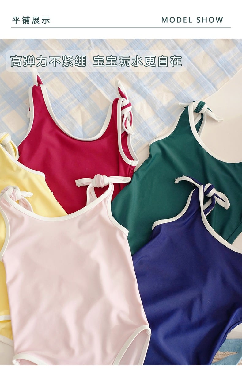 Bộ bơi liền thân kèm mũ trơn màu viền trắng nhiều màu bé gái size 80-130