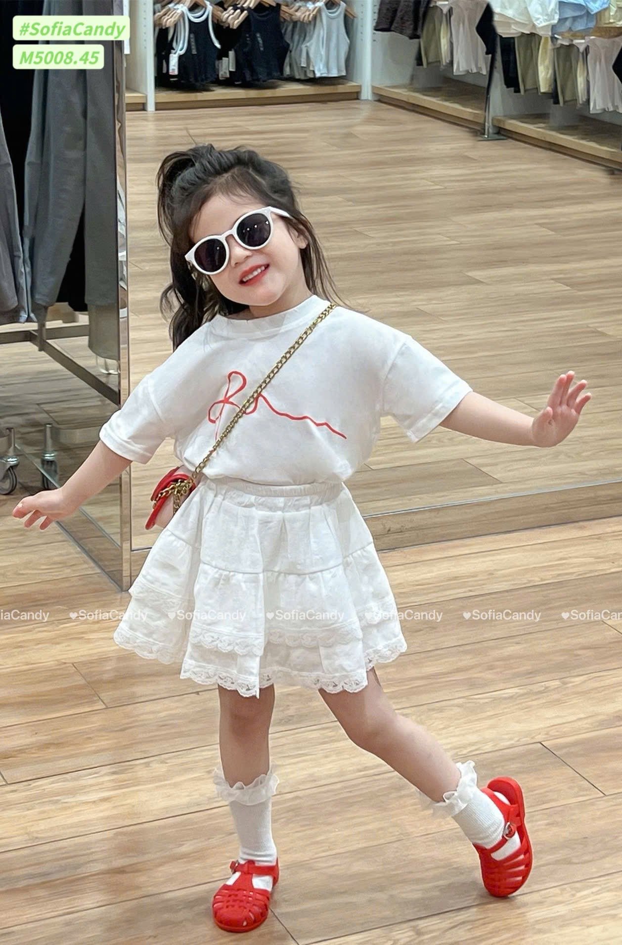 M5008 - Bộ Mia Kids áo trắng nơ phối chân váy liền quần bé gái size 1-10y