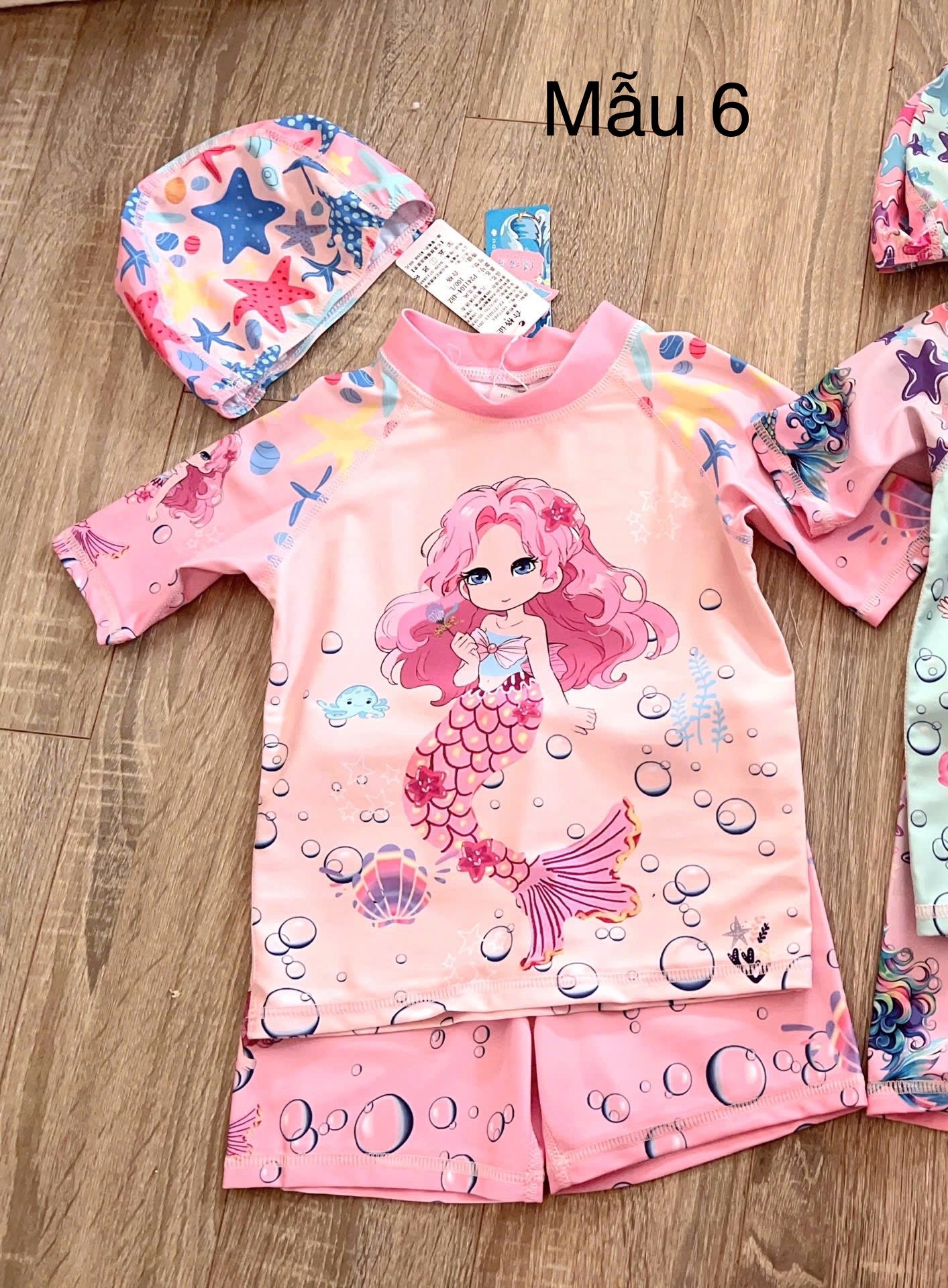 Bộ bơi 3ct kèm mũ hoạ tiết tiên cá nhiều màu cho bé gái size 90-140