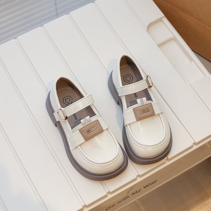 XXJ - 6180 - Giày moca Miu Miu 2 màu đen, kem cho bé gái size 26-36
