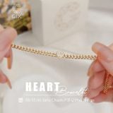  Lắc tay vàng 18k sợi khoen lật đơn giản đẹp hình trái tim đính kim cương Gix Jewel 