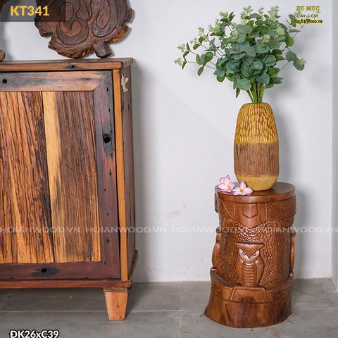 Đôn gỗ điêu khắc hình tượng dân gian