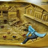 Tranh thiếu nữ thả hoa đăng cạnh chùa cầu