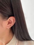  14K Lara Star labret piercing 