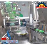 Máy đóng gói thạch ly cốc trạm xoay dán màng lắp tự động