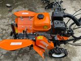 MÁY XỚI ĐẤT CẦU TRƯỚC CHẠY XĂNG