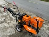 MÁY XỚI ĐẤT CẦU TRƯỚC CHẠY XĂNG