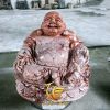 Tượng Phật Di Lặc Nhỏ Đá Đỏ Đặt Tại Bàn Thờ Thần Tài
