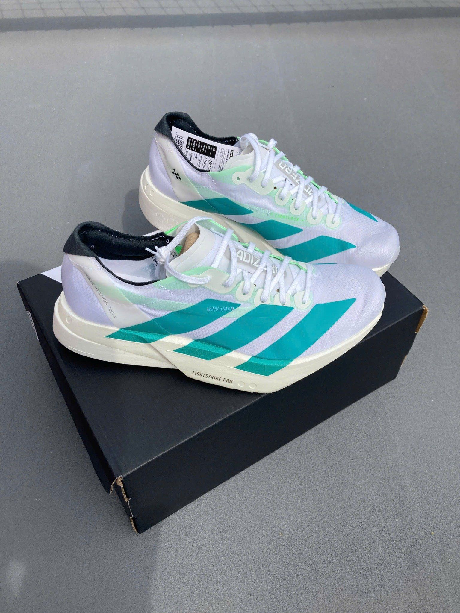 Giày Chạy Bộ Adizero Adios Pro 4 White Pulse Teal - JR1267