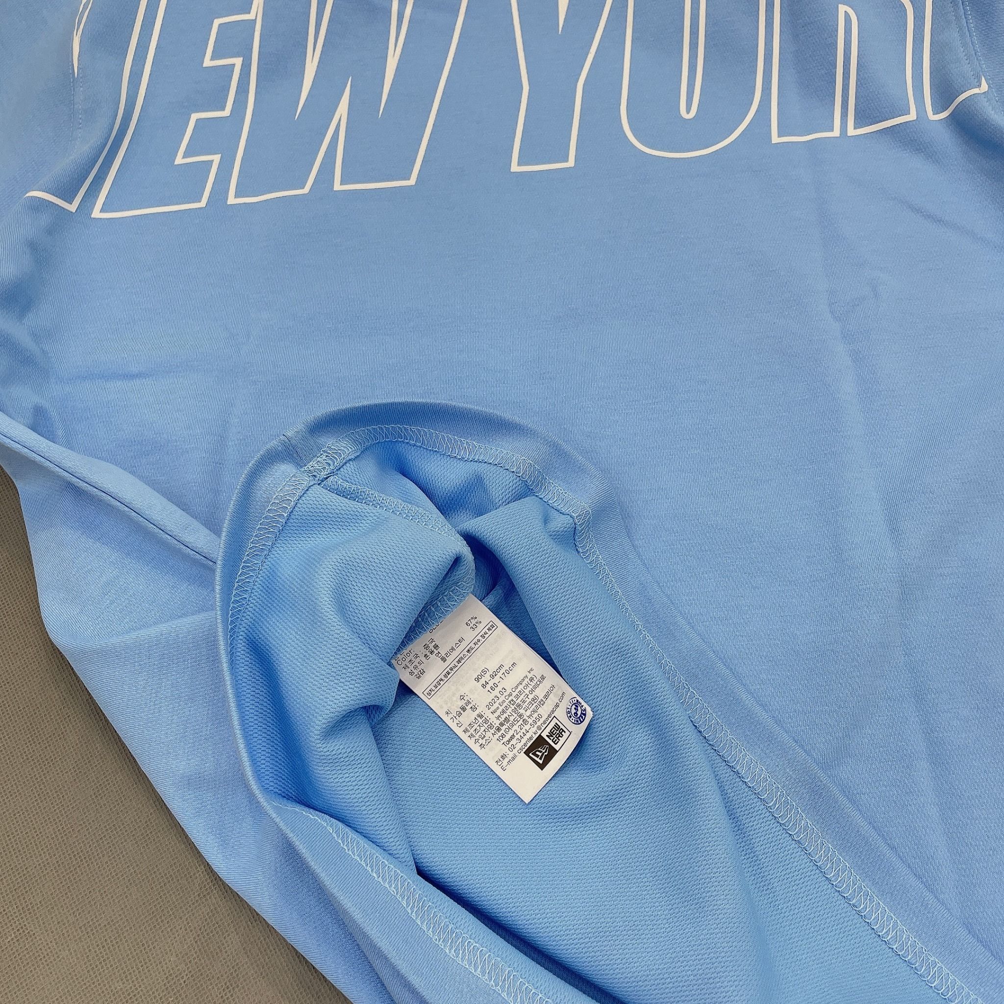  1174 - HÀNG CHÍNH HÃNG - ÁO THUN NEW ERA - NEW YORK CHẠY NGANG - BABY BLUE - CODE: 12354552 