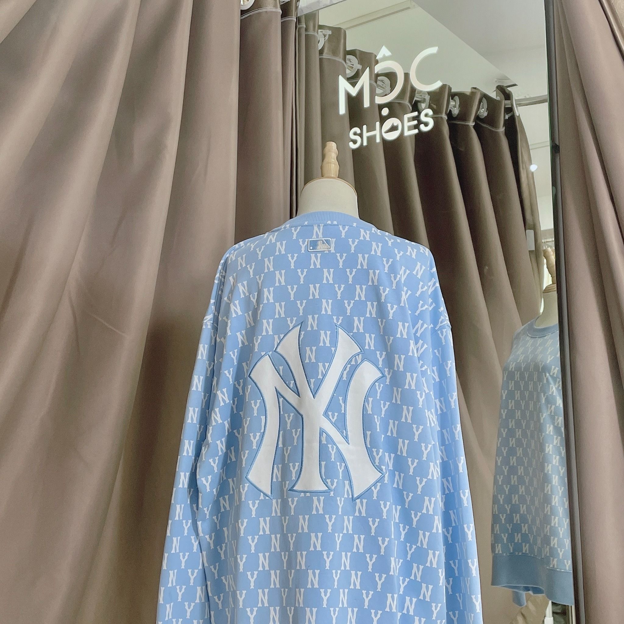  1662 - HÀNG CHÍNH HÃNG - ÁO SWEATER  MLB MONOGRAM ALLOVER OVERFIT SWEATSHIRT NEW YORK *NY BABYBLUE* - CODE: 3AMTM0221-50BLL 