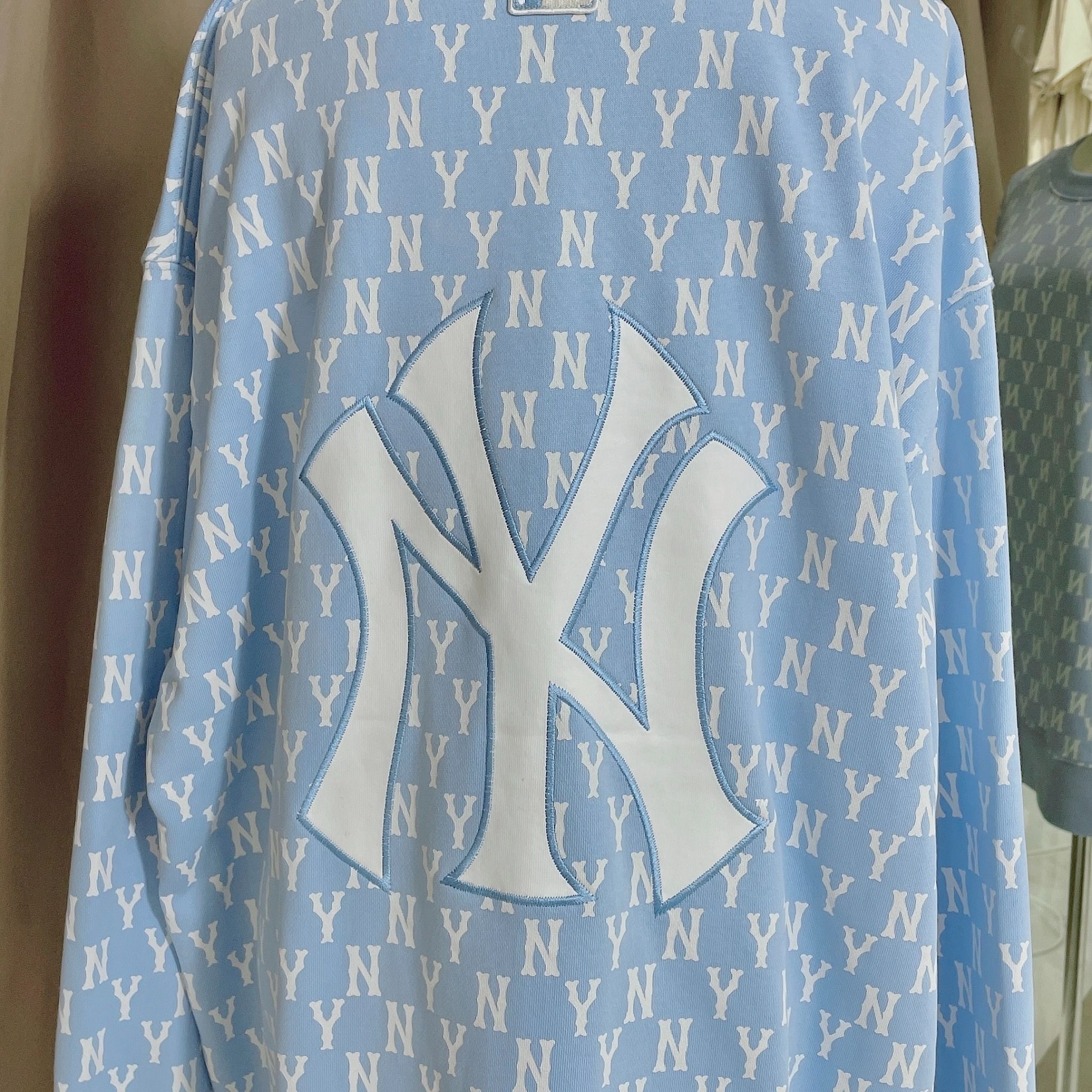  1662 - HÀNG CHÍNH HÃNG - ÁO SWEATER  MLB MONOGRAM ALLOVER OVERFIT SWEATSHIRT NEW YORK *NY BABYBLUE* - CODE: 3AMTM0221-50BLL 