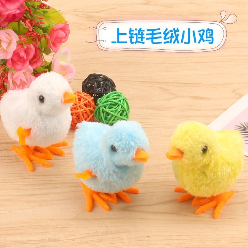 Gà con đồ chơi nhảy nhót hoạt động bằng dây cót D0108042