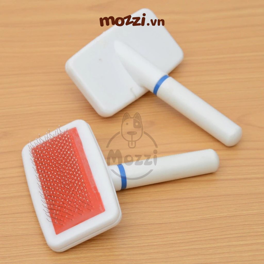 Lược chải lông chó mèo cán nhựa đầu bọc cao su mềm