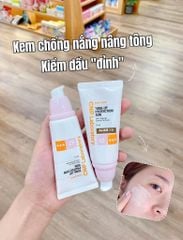 Set kem chống nắng CNP 50ml+31ml nâng tone cho da dầu