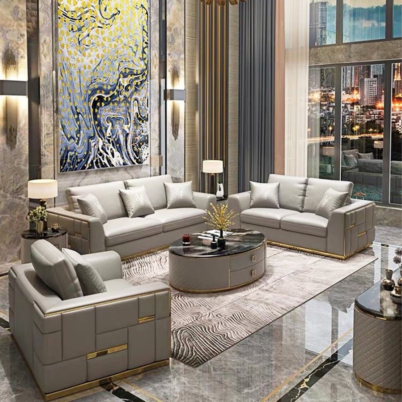Bộ sofa da màu kem phối đường viền và nẹp inox mạ vàng tạo điểm nhấn BSF176