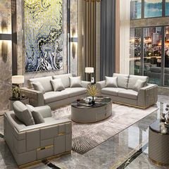 Bộ sofa da màu kem phối đường viền và nẹp inox mạ vàng tạo điểm nhấn BSF176