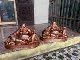 Tượng Di Lặc tựa bao tiền bằng đồng đỏ KT32x42cm - Đồng Đông Sơn