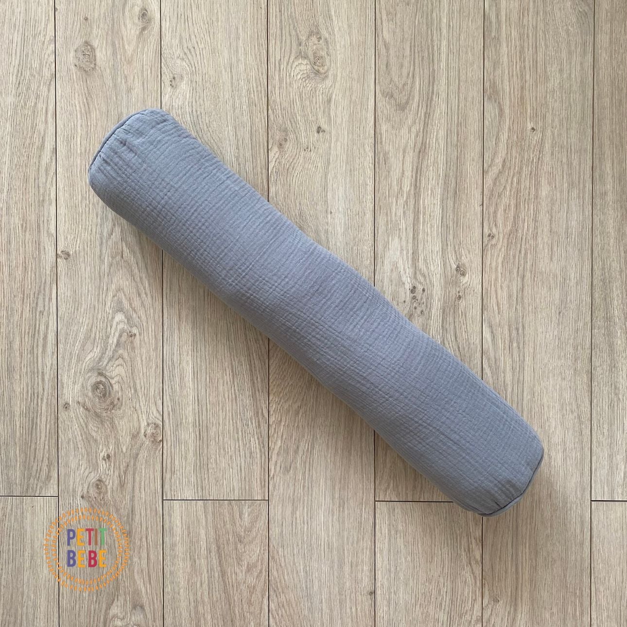  Gối ôm muslin màu trơn dài 60cm 